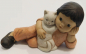 Preview: Nina & Marco Goebel Limpke: liegender Junge mit Katze L13,5cm (N)