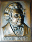 Preview: Ausdrucksstarkes Bronze Reliefbild Franz Schubert plastisch auf Holz 25x20,5cm (N)