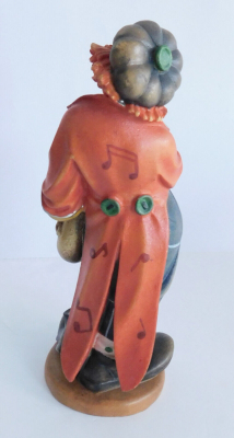 Detailliert geschnitzte Holzfigur Clown mit Saxophon farbig gefasst 19cm